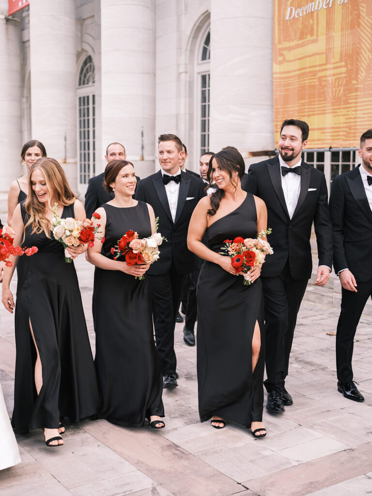 Black Bridesmaids Dresses with Red Bouquets
